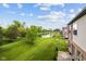 The backyard is expansive with a pond and lots of green space at 4261 Washington Blvd, Plainfield, IN 46168