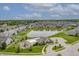 Beautiful aerial view of the community with a pond, clubhouse, pool and playground at 4428 Maldenhair Dr, Indianapolis, IN 46239