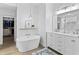 This bright bathroom boasts a soaking tub and a double vanity at 4428 Maldenhair Dr, Indianapolis, IN 46239