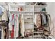 Walk-in closet with rows of shelving and rods providing ample storage for clothes, shoes, and accessories at 4428 Maldenhair Dr, Indianapolis, IN 46239