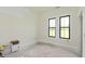Partially finished bedroom featuring double windows with green exterior views at 4457 E County Road 850 N, Pittsboro, IN 46167