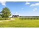Gorgeous home featuring lush green grass, a well manicured lawn, and a beautiful driveway at 4457 E County Road 850 N, Pittsboro, IN 46167