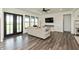 Open concept living room filled with lots of light from the black framed windows at 4457 E County Road 850 N, Pittsboro, IN 46167