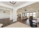 Spacious open-plan living area with wood floors, connecting to the kitchen and dining area at 4457 E County Road 850 N, Pittsboro, IN 46167