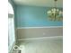 Bright dining room with a stylish chandelier and neutral decor at 4667 Sundance Trl, Indianapolis, IN 46239