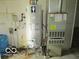 Utilities in basement featuring a water heater and HVAC system at 4667 Sundance Trl, Indianapolis, IN 46239