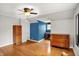 Bedroom featuring hardwood floors, a built-in desk, and plenty of storage space at 5104 Carvel Ave, Indianapolis, IN 46205