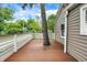 Exterior deck built around a mature tree, providing shade and privacy at 5104 Carvel Ave, Indianapolis, IN 46205