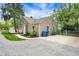 Well-maintained house featuring a gravel driveway and a nicely landscaped yard at 5104 Carvel Ave, Indianapolis, IN 46205