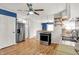 Bright kitchen with stainless steel appliances, white cabinets, and hardwood floors at 5104 Carvel Ave, Indianapolis, IN 46205