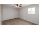 Cozy bedroom with soft carpeting, natural light, and a ceiling fan at 521 Sunset Dr, Edinburgh, IN 46124