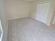 A vacant bedroom with neutral carpet and a closet offers a flexible living space at 5416 Straw Hat Dr, Indianapolis, IN 46237