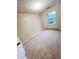 Bedroom featuring neutral carpet, natural light from a window, and a neutral color scheme at 5416 Straw Hat Dr, Indianapolis, IN 46237