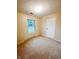 Cozy bedroom featuring neutral carpet, a window for natural light, and closet for storage at 5416 Straw Hat Dr, Indianapolis, IN 46237