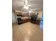 Well-lit kitchen with dark cabinets, matching appliances, and tile flooring for a clean and modern look at 5416 Straw Hat Dr, Indianapolis, IN 46237