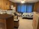 Bedroom with ceiling fan and wood paneled walls at 5585 Gallagher Dr, Greenwood, IN 46142