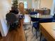 Dining area showcasing natural light and hardwood flooring at 5585 Gallagher Dr, Greenwood, IN 46142