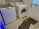 Laundry area showcasing modern washer and dryer units at 5585 Gallagher Dr, Greenwood, IN 46142