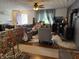 Spacious living room featuring a brick fireplace and modern furnishings at 5585 Gallagher Dr, Greenwood, IN 46142