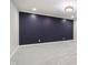 Spacious basement featuring plush carpeting and a dark accent wall at 5786 E Fall Creek Pkwy N Dr, Indianapolis, IN 46226