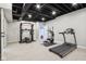 Finished basement featuring an exercise area with equipment at 5786 E Fall Creek Pkwy N Dr, Indianapolis, IN 46226