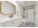 Modern bathroom with new vanity and patterned tile flooring, offering a stylish design at 5786 E Fall Creek Pkwy N Dr, Indianapolis, IN 46226