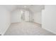 Spacious bedroom featuring an open closet area, neutral carpet, and a serene atmosphere at 5786 E Fall Creek Pkwy N Dr, Indianapolis, IN 46226