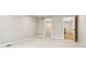 Neutral bedroom with an open closet provides ample storage and organization options at 5786 E Fall Creek Pkwy N Dr, Indianapolis, IN 46226