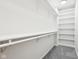 Well-organized closet with shelving and hanging rods for maximum storage capacity at 5786 E Fall Creek Pkwy N Dr, Indianapolis, IN 46226