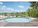 Inviting backyard pool with scenic lake views at 5786 E Fall Creek Pkwy N Dr, Indianapolis, IN 46226