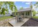 Relaxing backyard patio with outdoor seating, perfect for entertaining guests or enjoying peaceful outdoor meals at 5988 White Birch Dr, Fishers, IN 46038