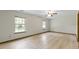 Bright bedroom boasts two large windows providing natural light and backyard views at 5988 White Birch Dr, Fishers, IN 46038