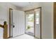 Inviting foyer with neutral tones and tile flooring, offering a warm welcome to the home's interior at 5988 White Birch Dr, Fishers, IN 46038