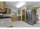 Spacious kitchen boasting stainless steel appliances, ample cabinet space, and an open layout for easy movement at 5988 White Birch Dr, Fishers, IN 46038
