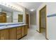 Bright main bathroom featuring dual sinks and separate tub and shower at 5988 White Birch Dr, Fishers, IN 46038
