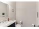 Bathroom offers a modern vanity with marble countertop and a framed mirror at 6078 Hardwick Dr, Whitestown, IN 46075