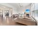 Bright and airy living room features vaulted ceilings, a fireplace, and hardwood floors at 6078 Hardwick Dr, Whitestown, IN 46075