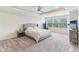 Cozy main bedroom featuring tray ceiling and natural light at 6078 Hardwick Dr, Whitestown, IN 46075