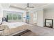 Bright main bedroom offers tray ceiling, natural light, and ensuite access at 6078 Hardwick Dr, Whitestown, IN 46075