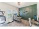 Home office with elegant accent wall and carpeted floors at 6078 Hardwick Dr, Whitestown, IN 46075