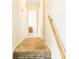 Carpeted hallway leading to a bedroom, offering a glimpse of the home's layout and comfortable living spaces at 6126 Rucker Rd, Indianapolis, IN 46220