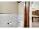 Half-bathroom with stylish marble tile backsplash at 6190 S 425 W, Pendleton, IN 46064
