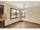 A dining room with large windows overlooking the property at 6190 S 425 W, Pendleton, IN 46064