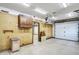 Well-lit garage interior with pegboard walls, convenient for storage and easy access to tools at 6190 S 425 W, Pendleton, IN 46064