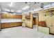 Organized garage space with abundant cabinetry, pegboard walls, and ample room for storage at 6190 S 425 W, Pendleton, IN 46064