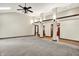 Open concept living room with trim accents, skylights, and natural light at 6190 S 425 W, Pendleton, IN 46064