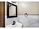 Stylish powder room featuring marble tile backsplash and a modern vanity at 6190 S 425 W, Pendleton, IN 46064