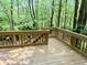 Wooden deck overlooking a lush, green wooded area offering peaceful outdoor living at 6242 Carrington Dr, Indianapolis, IN 46236