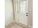 Entryway featuring glass doors, tile flooring and access to closet at 6242 Carrington Dr, Indianapolis, IN 46236