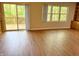 Inviting living room with access to a deck and views of trees through a window at 6242 Carrington Dr, Indianapolis, IN 46236
